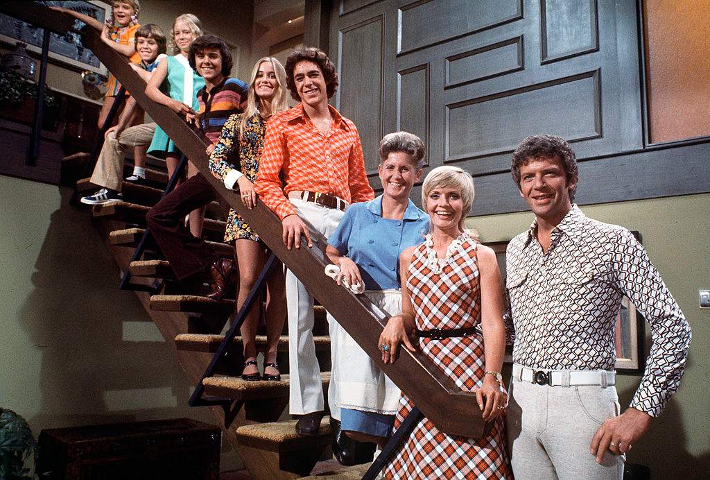 Mike Brady (Robert Reed), an architect with three sons, married Carol (Florence Henderson), a widow with three daughters. Their children were, from bottom: Greg (Barry Williams), Marcia (Maureen McCormack), Peter (Christopher Knight), Jan (Eve Plumb), Bobby (Mike Lookinland) and Cindy (Susan Olsen). Alice (Ann B. Davis) was the family’s housekeeper. (Photo by ABC Photo Archives/ABC via Getty Images)