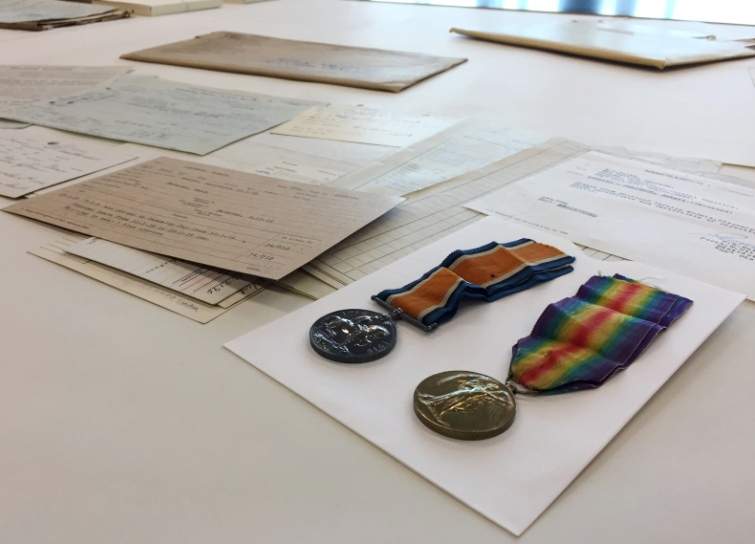 Medals and paper records are displayed at the Library and Archives Canada preservation centre in Gatineau, QC on Nov. 1, 2016.