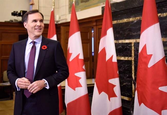 Minister of Finance Bill Morneau arrives for a press conference before tabling the Fall Economic Statement, on Parliament Hill, Tuesday, Nov. 1, 2016 in Ottawa. THE CANADIAN PRESS/Justin Tang.