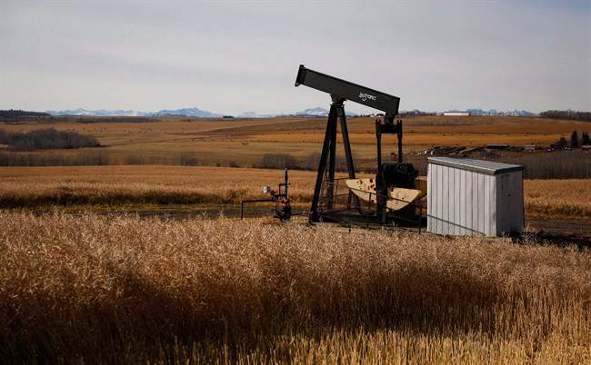 A de-commissioned pumpjack is shown at a well head on an oil and gas installation near Cremona, Alta., Saturday, Oct. 29, 2016. When it comes to protecting thousands of remote oil and gas well sites scattered across Alberta's prairies and foothills, RCMP Cpl. Curtis Peters is more concerned about crack addicts than vandals. 