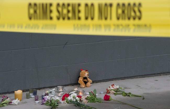 A makeshift memorial is seen outside Abbotsford Secondary School in in Abbotsford, B.C., Wednesday, Nov. 2, 2016.