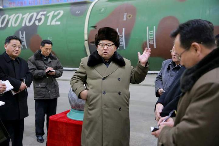 North Korean leader Kim Jong Un meets scientists and technicians in the field of research into nuclear weapons in this undated photo released by North Korea's Korean Central News Agency in Pyongyang March 9, 2016.     