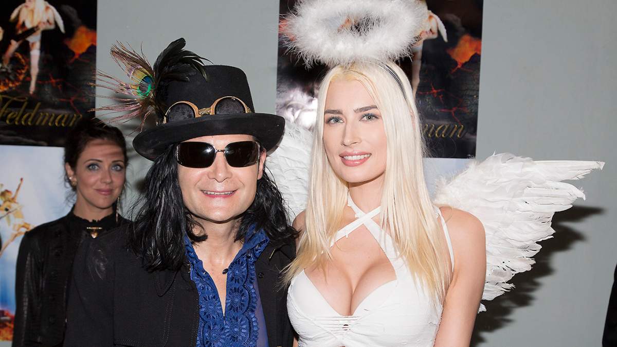 Corey Feldman (L) and Courtney Anne Mitchell aka DJ AC attend Feldman's Album Release Party For "Angelic 2 The Core" at Adults Only on June 29, 2016 in Los Angeles, California.