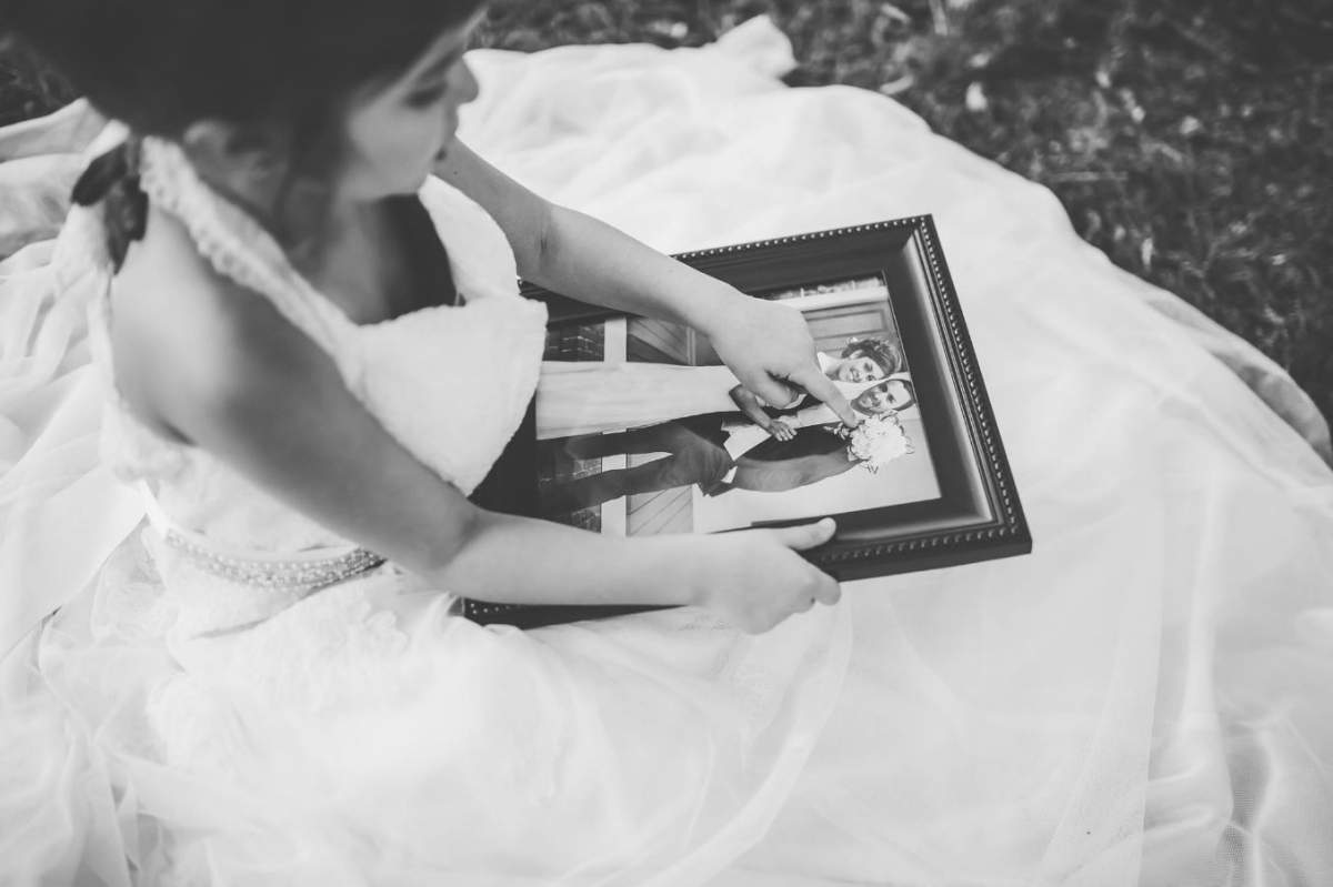Girl wears late mother’s wedding dress, fulfilling her last wish - image