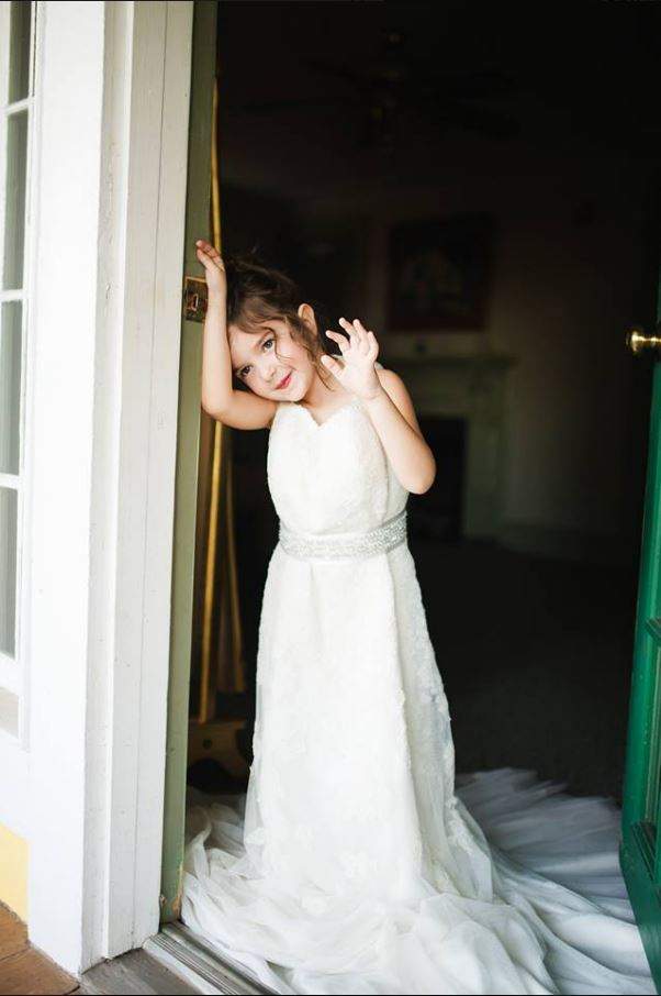 Girl wears late mother’s wedding dress, fulfilling her last wish - image