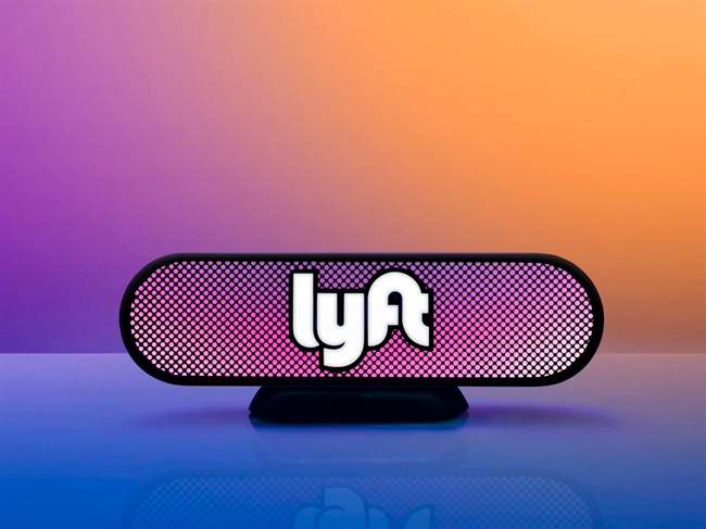 This undated photo provided by Lyft shows an illuminated Lyft beacon. Ride-hailing service Lyft, the underdog rival to Uber, is getting rid of its iconic pink moustache logo and replacing it with something more useful: a beacon. 