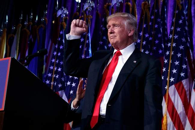 President-elect Donald Trump pumps his fist during an election night rally, Wednesday, Nov. 9, 2016, in New York. 