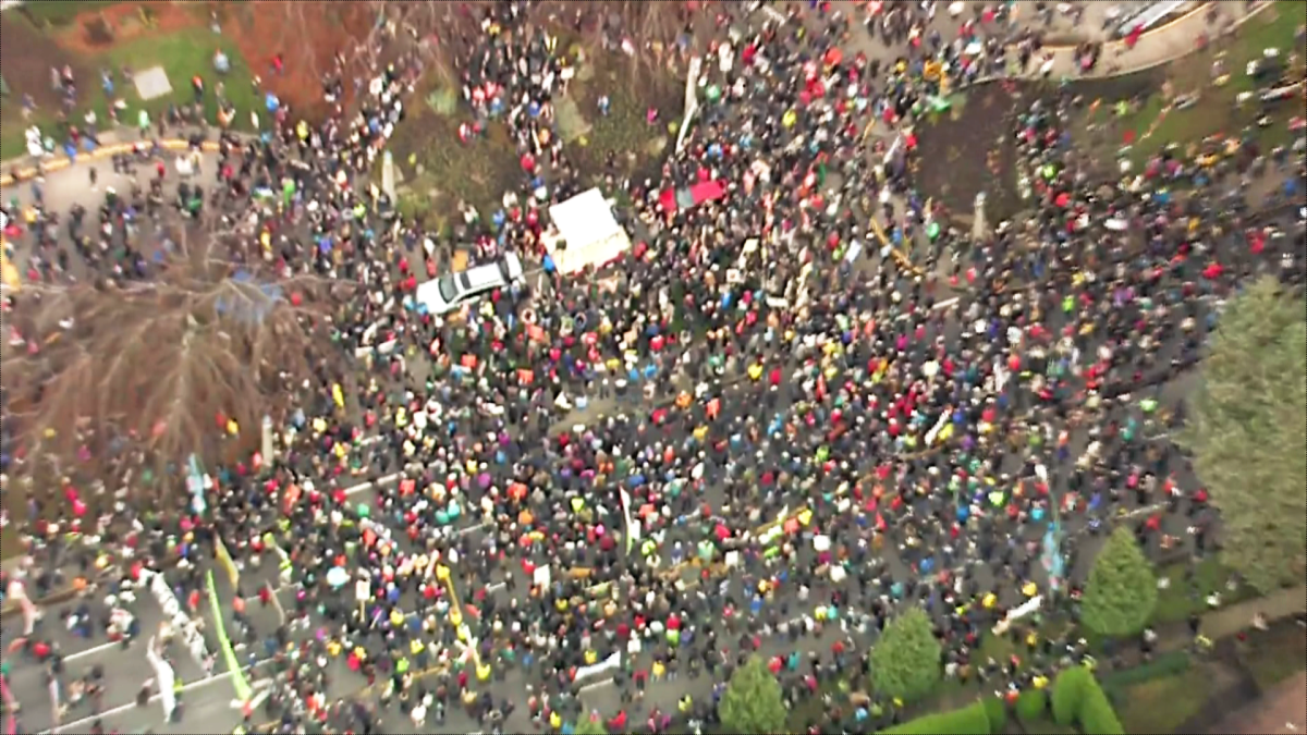 An aerial view of crowds gathering outside Vancouver City Hall protesting the Kinder Morgan TransMountain pipeline expansion.