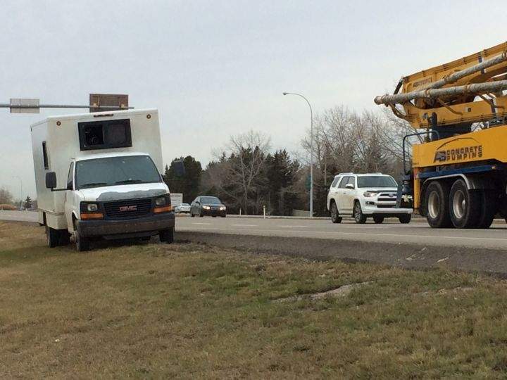 A photo radar truck sits on the side of Highway 16A in Spruce Grove.