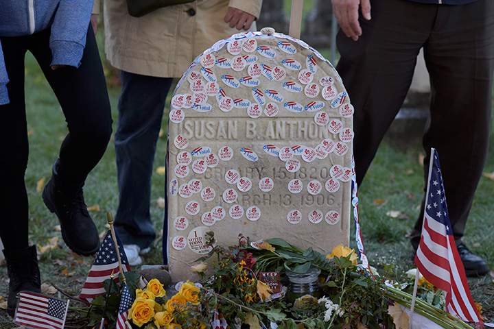 People visit the grave of women’s suffrage leader Susan B. Anthony on U.S. Election Day at Mount Hope Cemetery in Rochester, New York November 8, 2016.