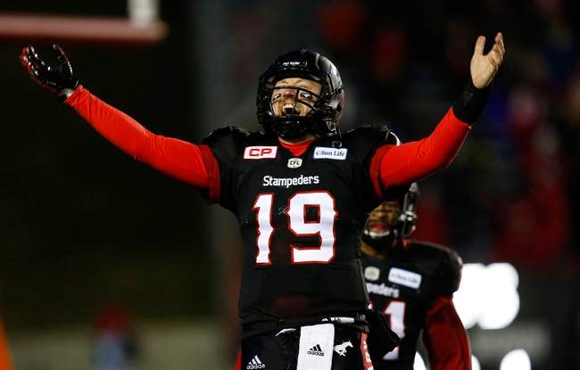Calgary Stampeders' quarterback Bo Levi Mitchell reacts after his touchdown throw against the B.C. Lions during fourth quarter CFL Western Final football action in Calgary, Sunday, Nov. 20, 2016.
