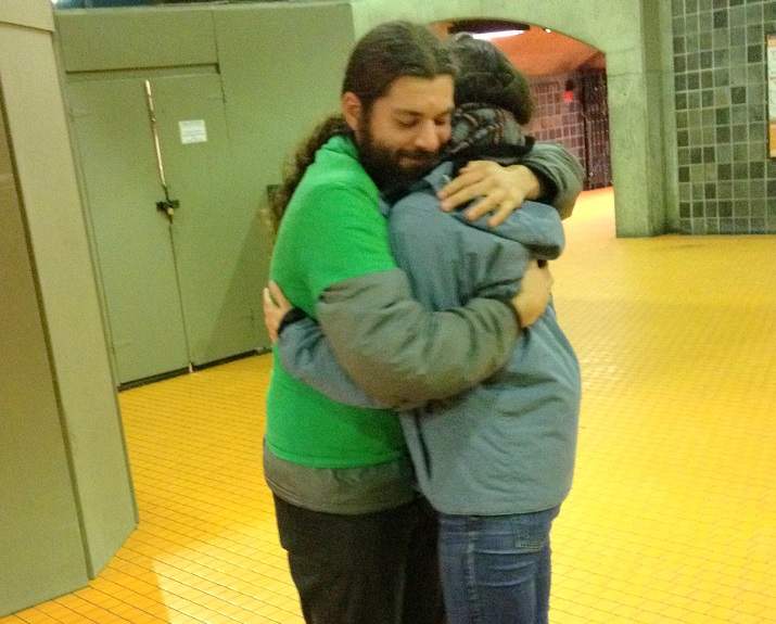 Tommy Boucher giving out free hugs in the Montreal Metro.
