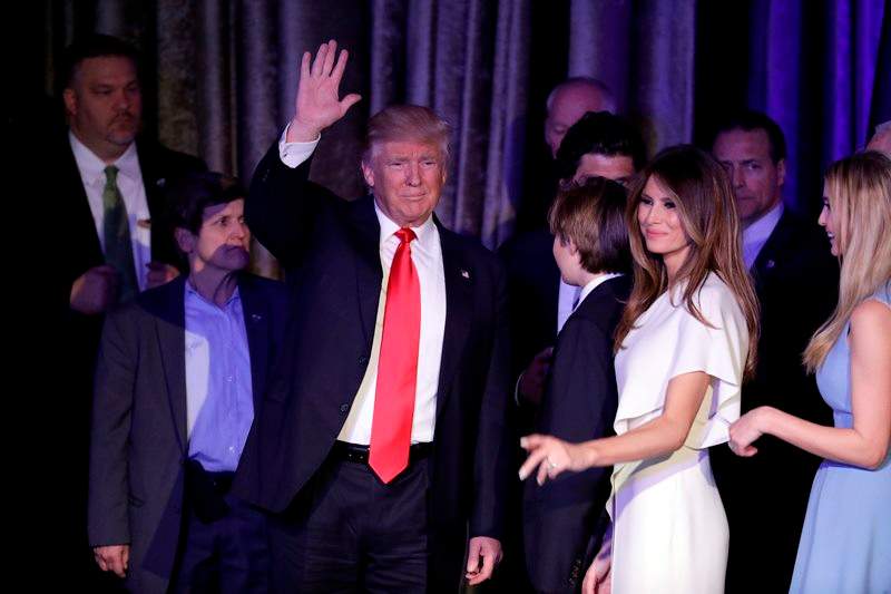President-elect Donald Trump waves to his supporters after giving his acceptance speech during his election night rally, Wednesday, Nov. 9, 2016, in New York. 