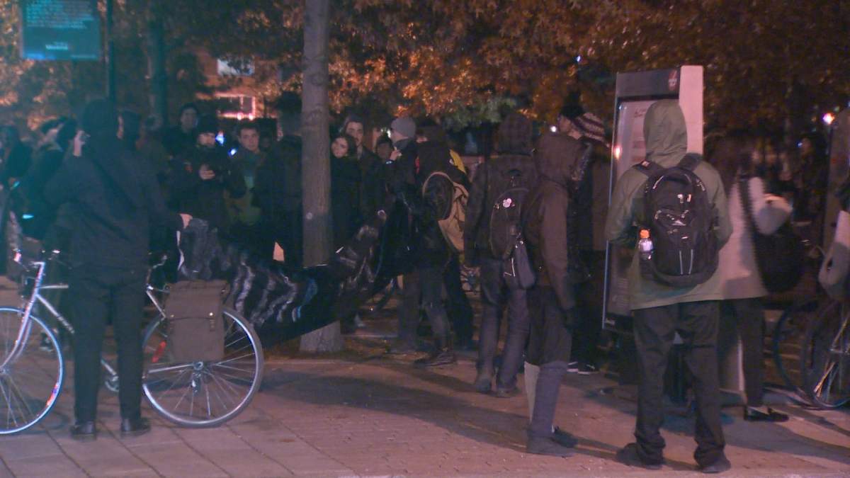 Dozens of people gathered in downtown Montreal to march against Donald Trump, Thursday, November 10, 2016.