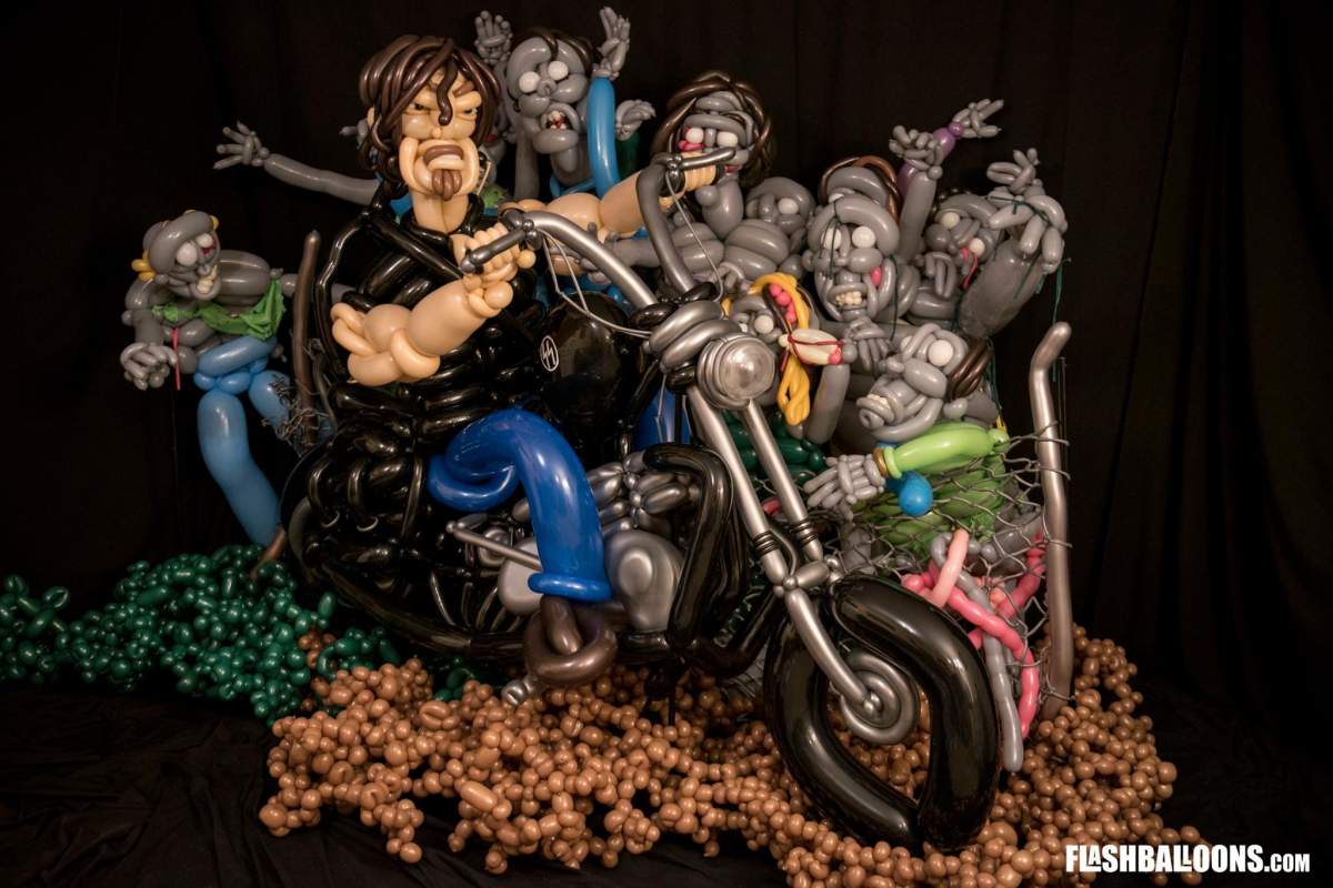 The balloon artist, who said he did not design the piece before starting, said it took him one week to create the scene.