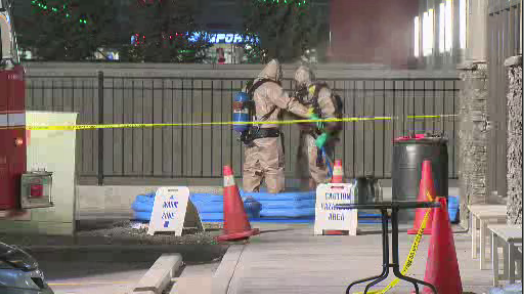 Crews search a southwest apartment Friday, Nov.18 after a white powder was discovered inside.
