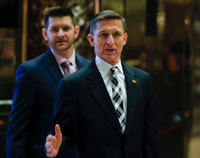  In this Nov. 17, 2016 file photo, Retired Lt. Gen Michael Flynn talks to media as he arrives at Trump Tower in New York. The military parade for Donald Trump has come early. Two months before Inauguration Day festivities, an extraordinary number of recently retired generals, including a few who clashed with President Barack Obama‚Äôs administration, are marching to the president-elect‚Äôs doorstep for job interviews.