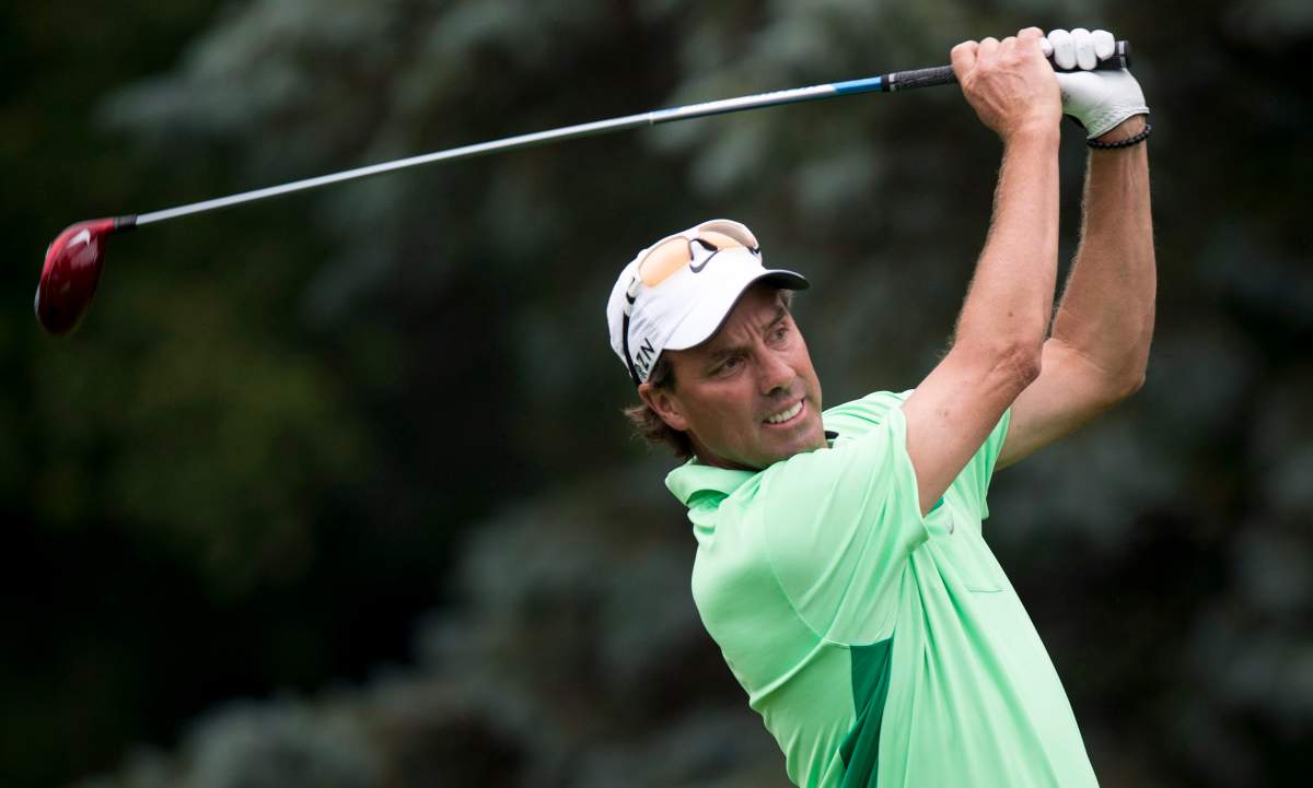 Stephen Ames from Calgary hits off the 12th tee during the Pro-Am at the Canadian Open golf championship Wednesday, July 23, 2014 in Montreal.