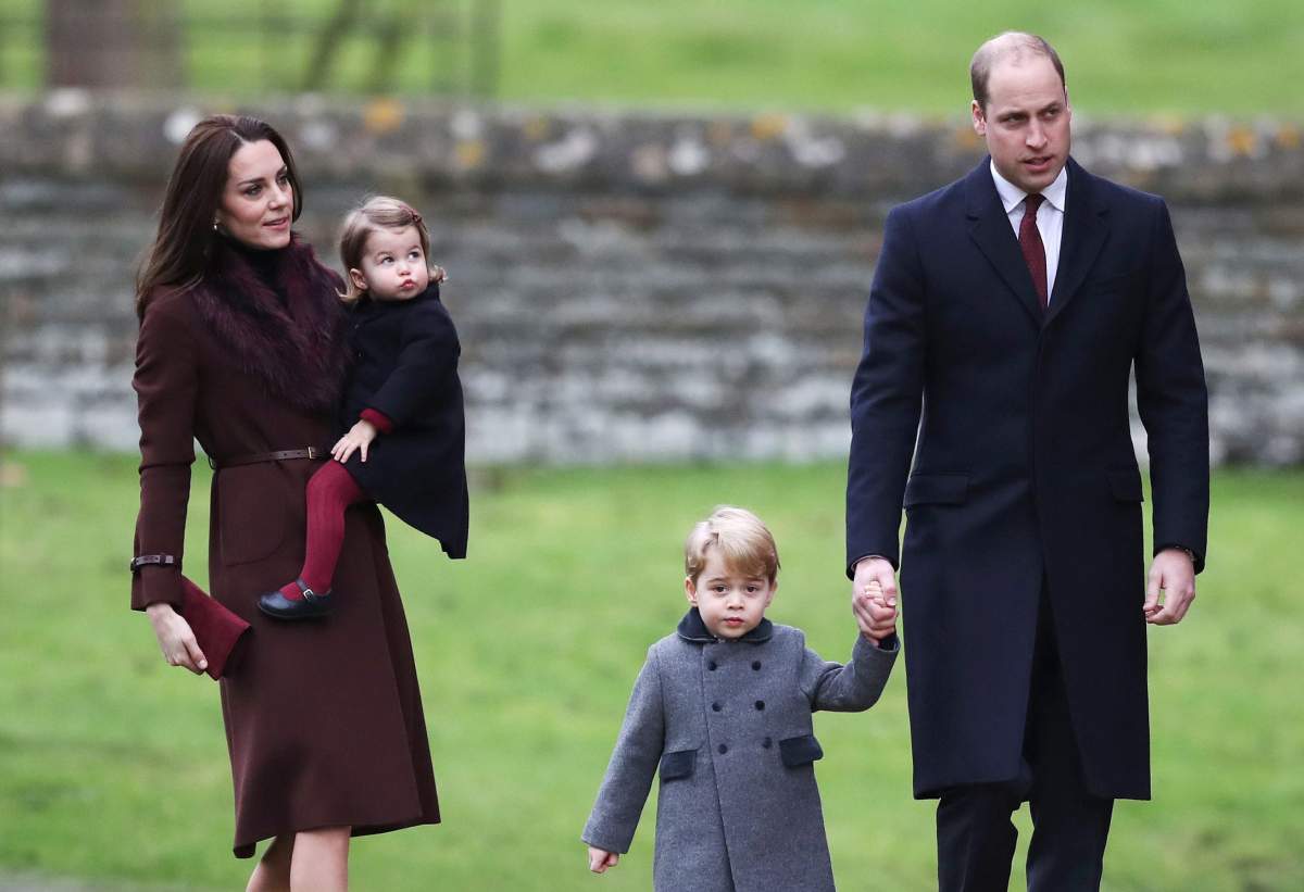 Britain’s Prince William and Kate, the Duchess of Cambridge with their children Prince George and Princess Charlotte arrive to attend the morning Christmas Day service at St Mark’s Church in Englefield, England, Sunday Dec. 25, 2016. A heavy cold is keeping Queen Elizabeth II from attending the traditional Christmas morning church service near her Sandringham estate in rural Norfolk, England. (Andrew Matthews/PA via AP)