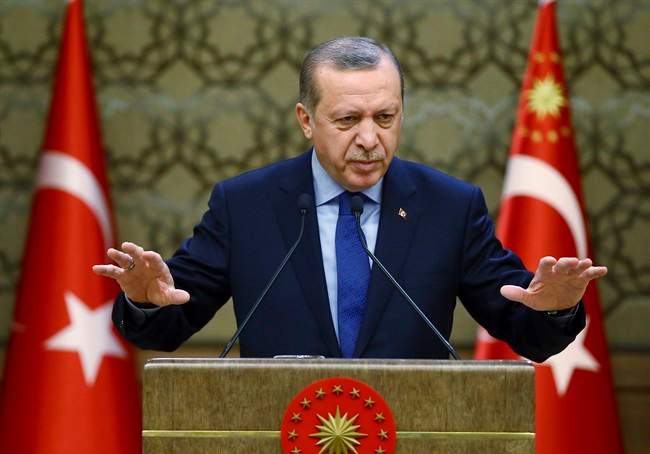 Turkey's President Recep Tayyip Erdogan addresses local administrators in Ankara, Turkey, Wednesday, Dec. 7, 2016.