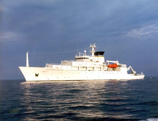 In this undated photo released by the U.S. Navy Visual News Service, the USNS Bowditch, a T-AGS 60 Class Oceanographic Survey Ship, sails in open water. The USNS Bowditch, a civilian U.S. Navy oceanographic survey ship, was recovering two drones on Thursday when a Chinese navy ship approached and sent out a small boat that took one of the drones, said Navy Capt. Jeff Davis, a Pentagon spokesman. He said the Chinese navy ship acknowledged radio messages from the Bowditch, but did not respond to demands the craft be returned. 