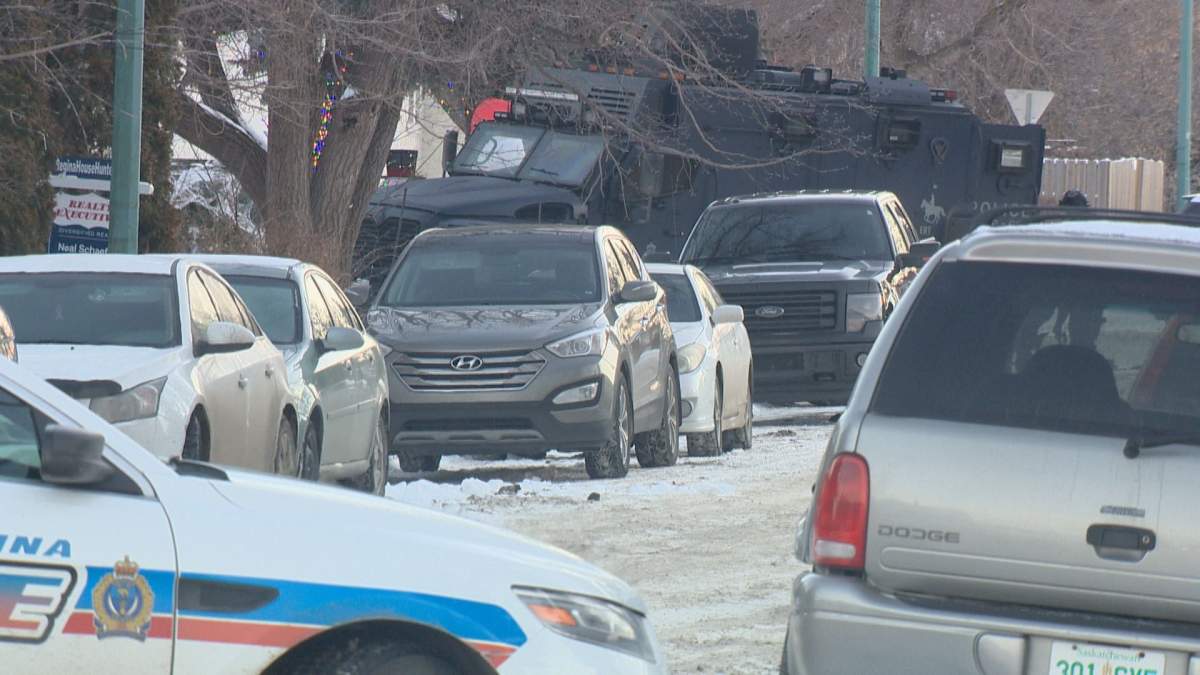 Regina Police and SWAT surround a home on Broder Street Thursday.