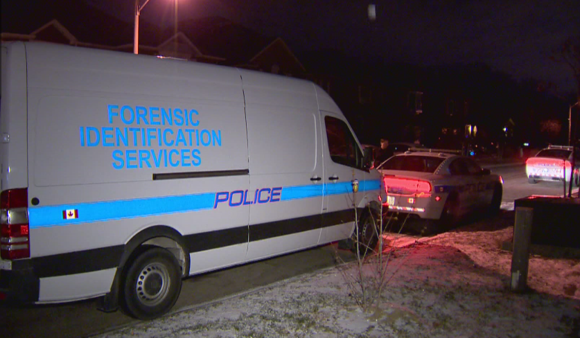 Peel Regional Police Forensic Identification Services vehicle outside a home on Moorehead Crescent after a violent home invasion on Saturday, December 10, 2016