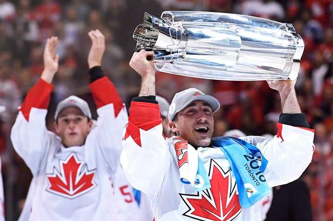 Team Canada’s Brad Marchand (63) hoists the trophy following his team’s victory over Team Europe during World Cup of Hockey finals action in Toronto on Thursday, September 29, 2016.