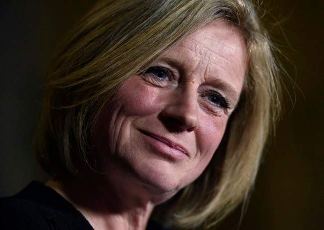 File: Alberta Premier Rachel Notley speaks to reporters during a media availability on Parliament Hill, Tuesday, Nov. 29, 2016 in Ottawa. 