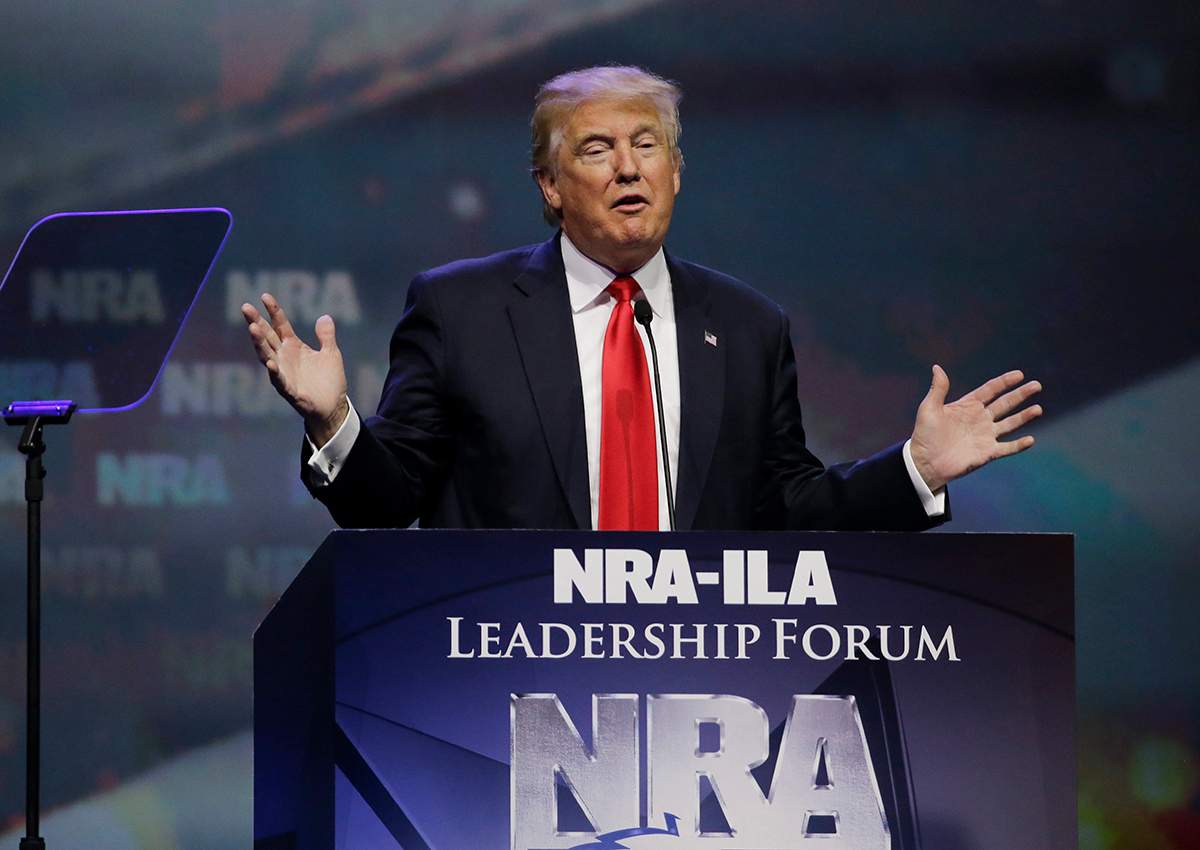In this May 20, 2016, file photo, then-Republican presidential candidate Donald Trump speaks at the National Rifle Association (NRA) convention in Louisville, Ky.