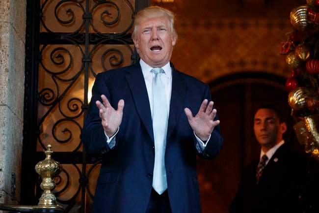 President-elect Donald Trump speaks to reporters at Mar-a-Lago, Wednesday, Dec. 28, 2016, in Palm Beach, Fla.
