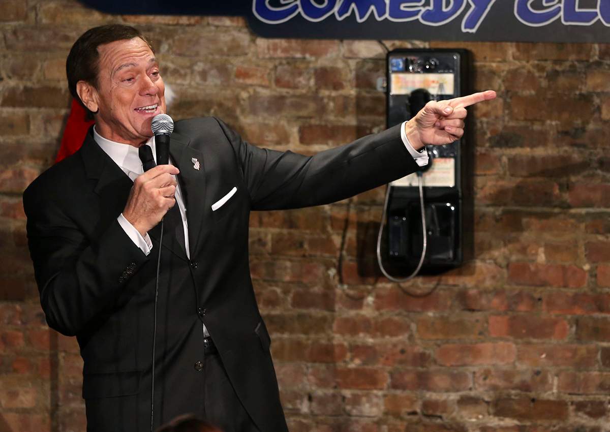 Joe Piscopo sings an updated "New York, New York,"  during an event to help raise funds for the Boys and Girls Club of America at the Stress Factory Comedy Club Tuesday, Dec. 6, 2016, in New Brunswick, N.J. 