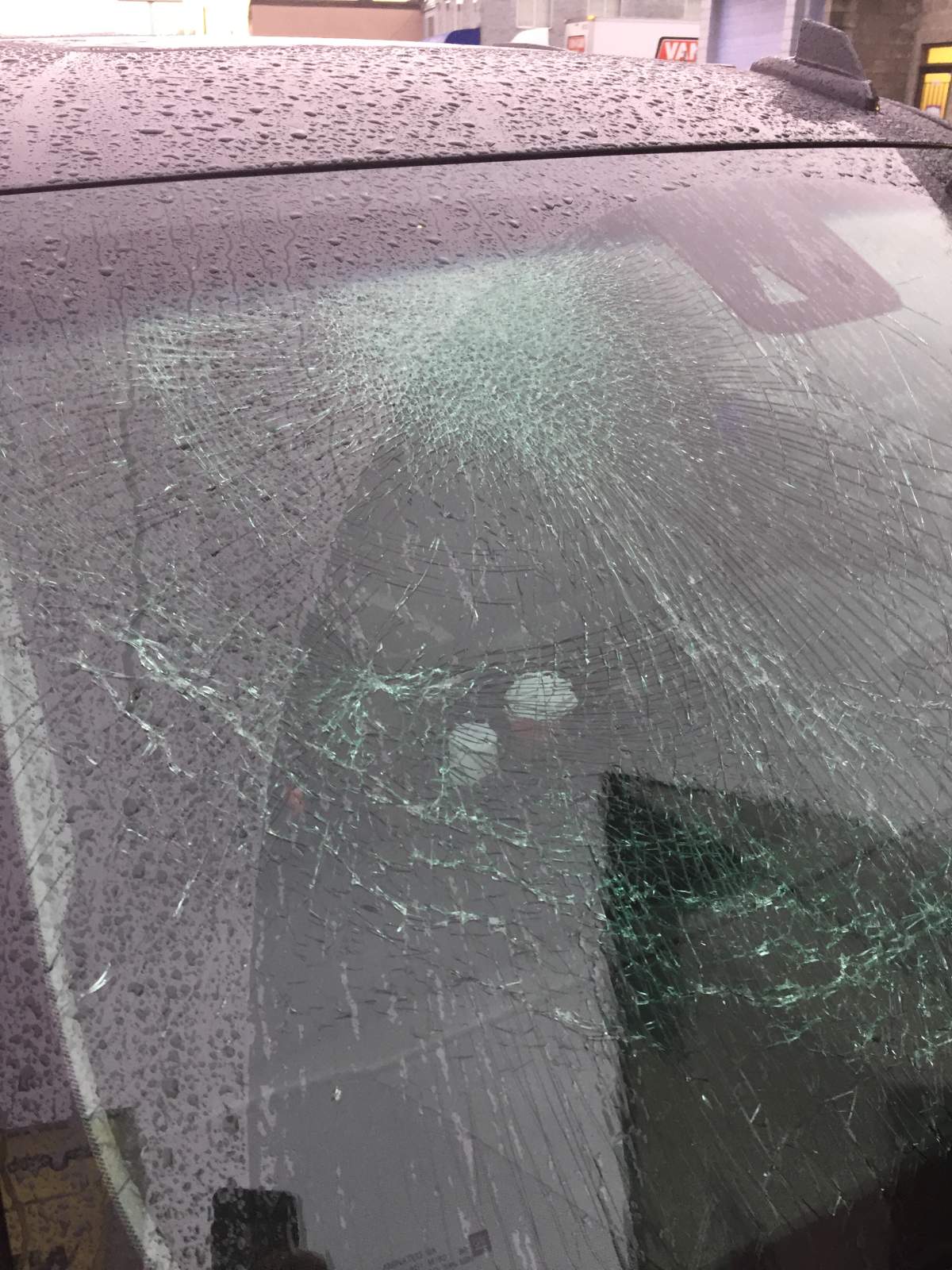 Neil Thompson’s car was also struck by falling ice on the Port Mann Bridge on Monday, cracking his windshield.