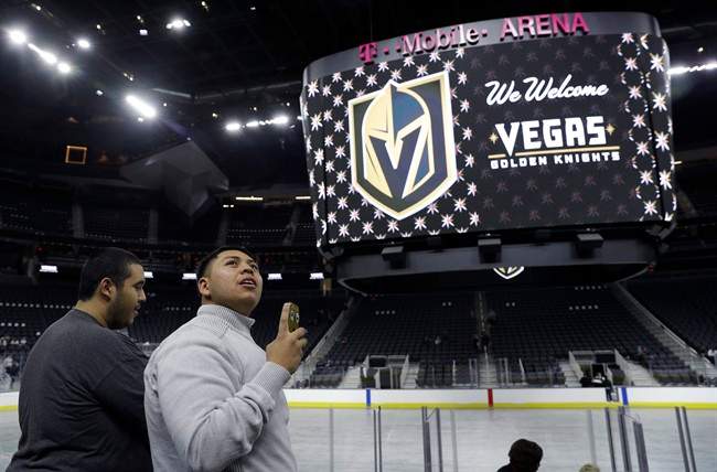FILE – In this Nov. 22, 2016, file photo, people tour T-Mobile Arena during an event to unveil the name of Las Vegas’ National Hockey League franchise, in Las Vegas.