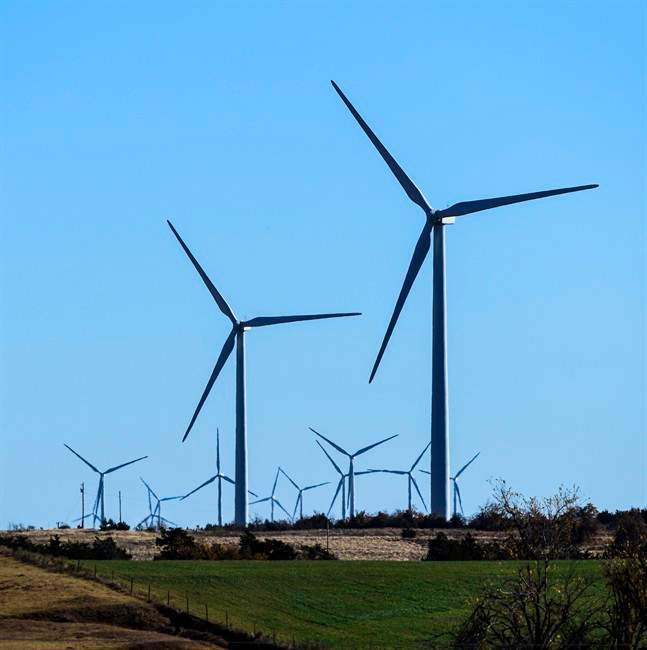 This photo provided by Google shows windmills at a wind farm in Minco, Okla., that provides Google with some of its renewable energy. 