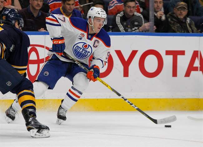 Edmonton Oilers Connor McDavid (97) controls the puck during the second period of an NHL hockey game against the Buffalo Sabres, Tuesday, Dec. 6, 2016, in Buffalo, N.Y. 