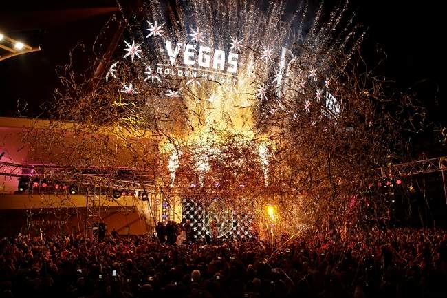 In this Nov. 22, 2016, file photo, confetti streams above the crowd during an event to unveil the Vegas Golden Knights.