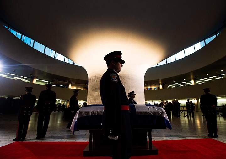An honour guard is seen at former Toronto mayor Rob Ford’s casket at city hall on Monday, March 28, 2016.