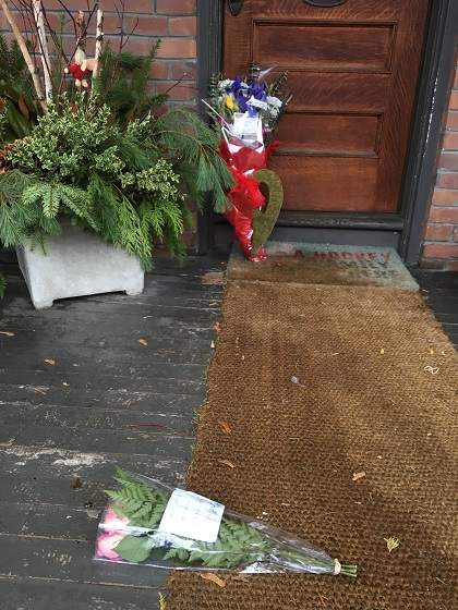 Flowers have been left outside of the family’s Toronto home.