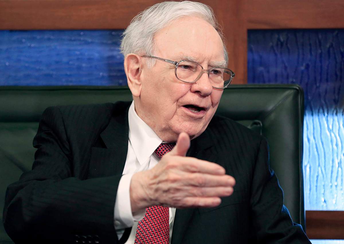 In this Monday, May 4, 2015, file photo, Berkshire Hathaway Chairman and CEO Warren Buffett speaks during an interview with Liz Claman on the Fox Business Network in Omaha, Neb.