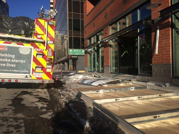 A temporary wall was blown down by high winds on 8 Street and 14 Avenue S.W. on Dec. 19, 2016.