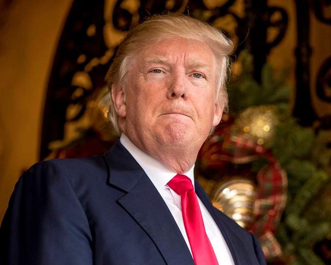 President-elect Donald Trump takes a question from a member of the media at Mar-a-Lago, in Palm Beach, Fla., Wednesday, Dec. 21, 2016. 