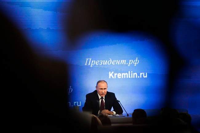 Russian President Vladimir Putin speaks during his annual news conference in Moscow, Russia, Friday, Dec. 23, 2016.