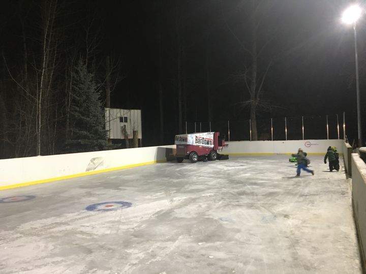 Jesse Myshak takes his Zamboni for a spin on his backyard rink just outside of Stony Plain, Alta.