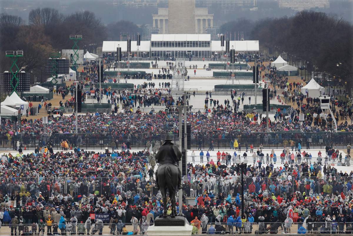 Crowds fill in along the National Mall before the swearing in of Donald Trump as the 45th president of the Untied States during the 58th Presidential Inauguration at the U.S. Capitol in Washington. Friday, Jan. 20, 2017.