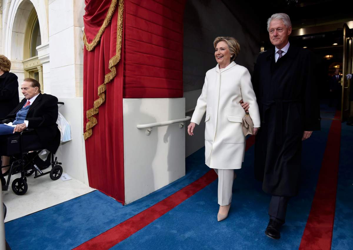 Former U.S. President Bill Clinton and First Lady Hillary Clinton arrive for the Presidential Inauguration of Trump at the U.S. Capitol in Washington, D.C., U.S., January 20, 2017. REUTERS/Saul Loeb/Pool