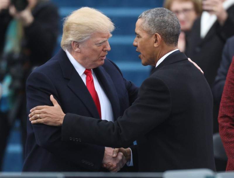 U.S. President-elect Donald Trump greets outgoing President Barack Obama (R) before Trump is inaugurated during ceremonies on the Capitol in Washington, U.S., January 20, 2017.