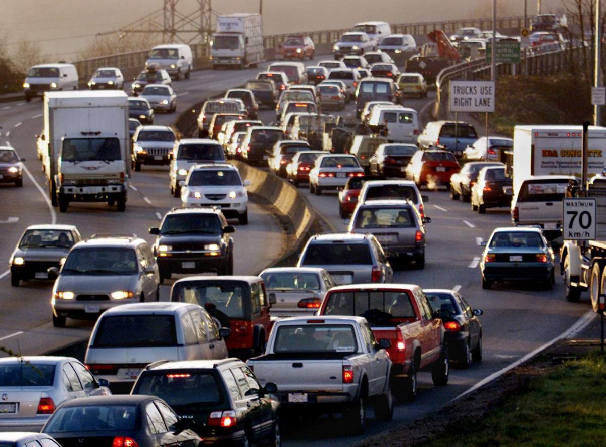 FILE. Vehicles slowly wind their way onto the Second Narrows Bridge from North Vancouver during early morning rush hour.