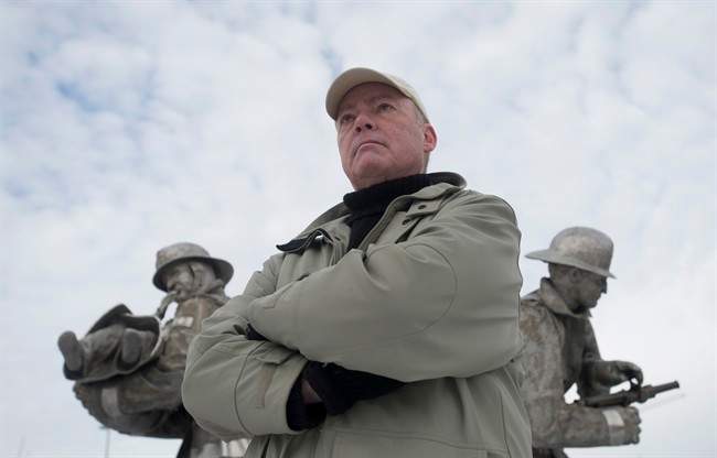 Former firefighter Norman Traversy poses for a photo at a firefighters memorial Tuesday, January 17, 2017 in Ottawa. Traversy, a former Mississauga firefighter with PTSD, is supporting a private member's bill that would create a national framework to track the disorder.