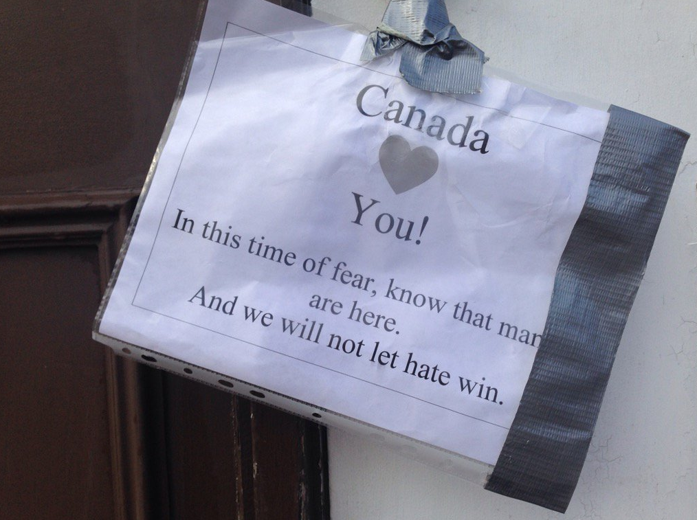 A message of love and support is seen taped to the outside of the Albarakan Mosque in Halifax in light of the shooting at a Quebec City mosque on Jan. 29, 2017.
